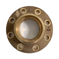Bronze flange with bolt holes and cast markings